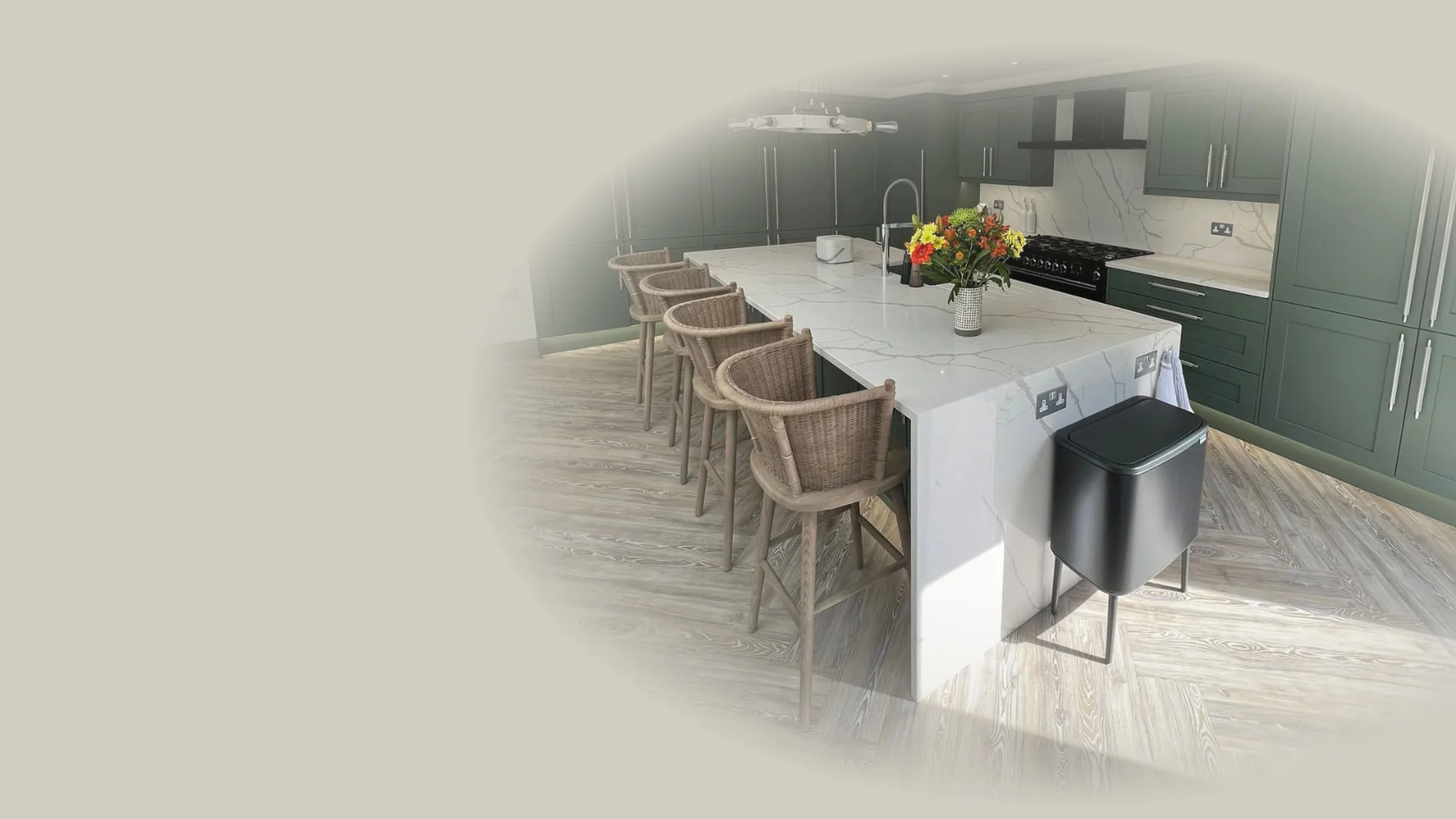 Polished stone kitchen worktop with an undermounted sink